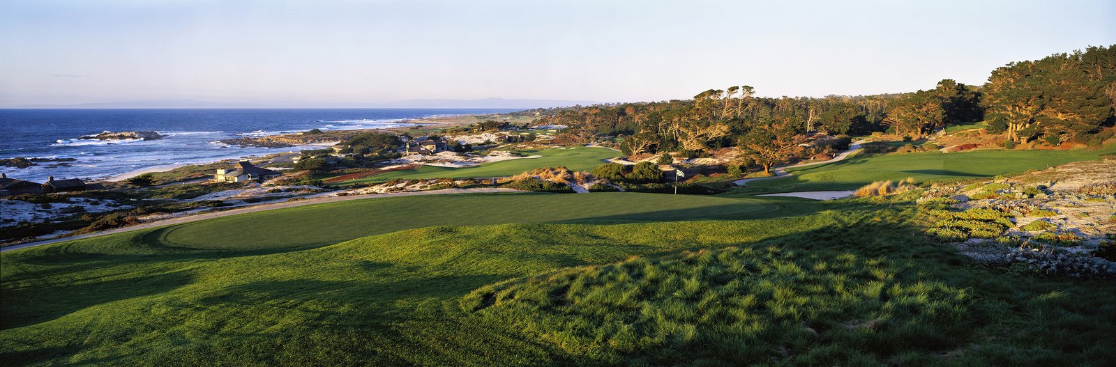 Spyglass Hill Golf Course Hole 2 approach bordered by sand dunes and Del Monte Forest pines